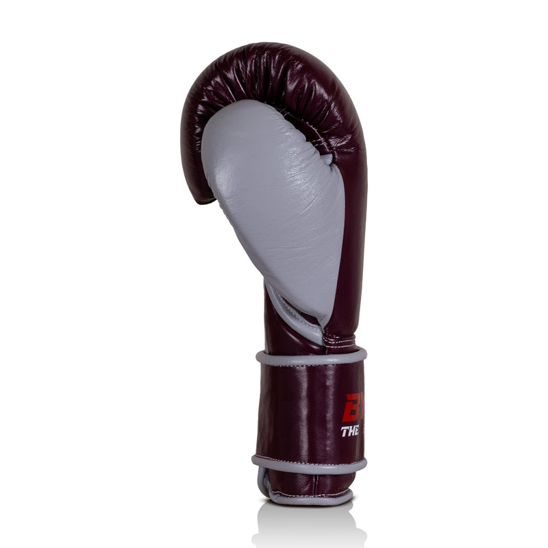 BYKO Impact maroon gray boxing gloves side angle with thumb protection 