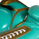 BYKO Bump green golden gloves close-up padding detail